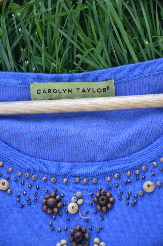 Blue Sleeveless Top with Beaded Neckline