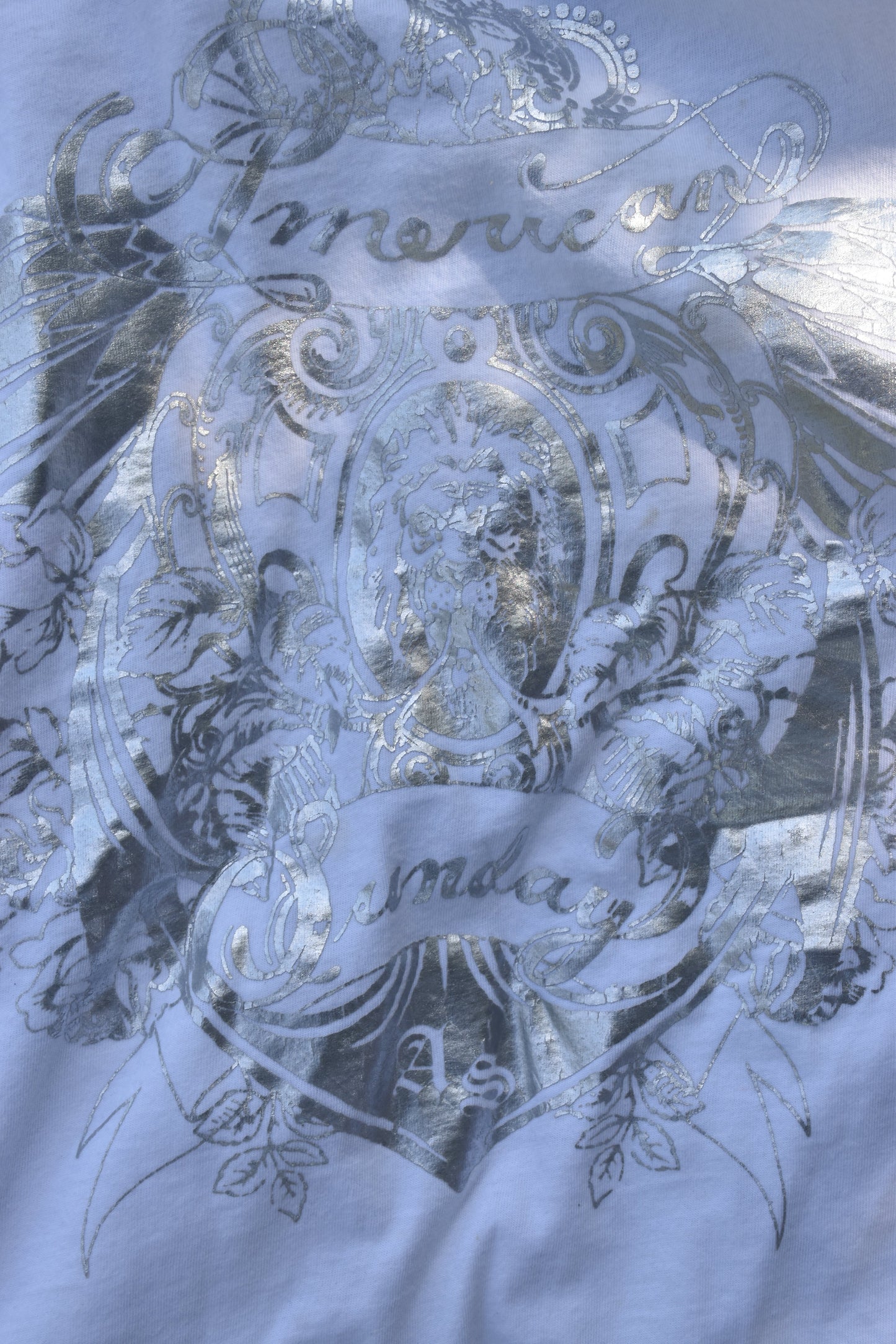 White t-shirt with silver graphic
