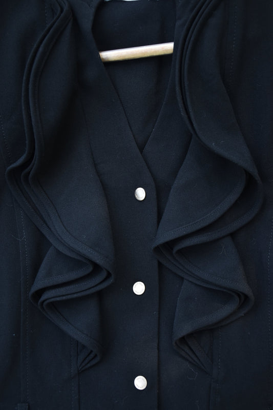 Sleeveless Black Dress with Pleats and Ruffle Trim Lapel